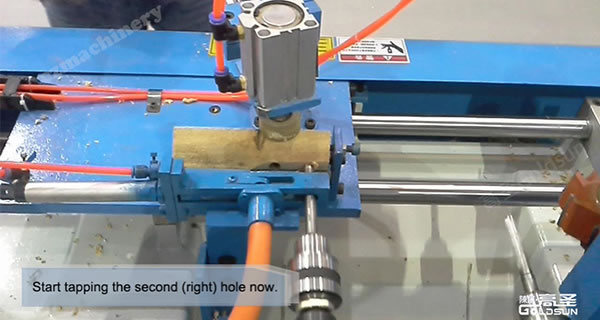 Tapping at the left second workstation